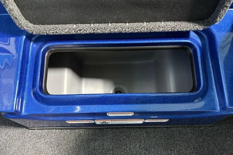 Slide: The Image of Open storage compartment in a 2026 Nitro Z17 boat, featuring a sleek blue finish. - 9