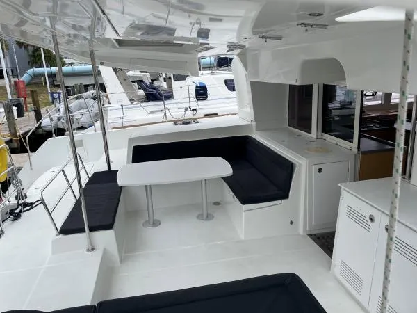 Slide: The Image of Spacious 2018 Lagoon 450 F yacht cockpit with seating and dining area. - 12