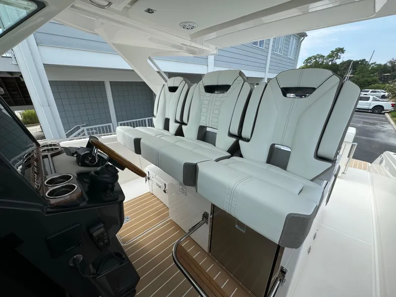 Slide: The Image of 2025 Tiara Yachts 34 LS interior with modern seating and sleek design. - 5