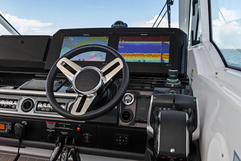 Slide: The Image of 2023 Formula 380 Super Sport Crossover OB dashboard with advanced navigation displays. - 10