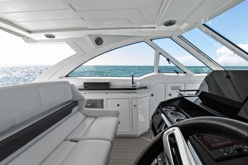 Slide: The Image of Interior of 2023 Formula 380 Super Sport Crossover OB yacht with ocean view. - 12