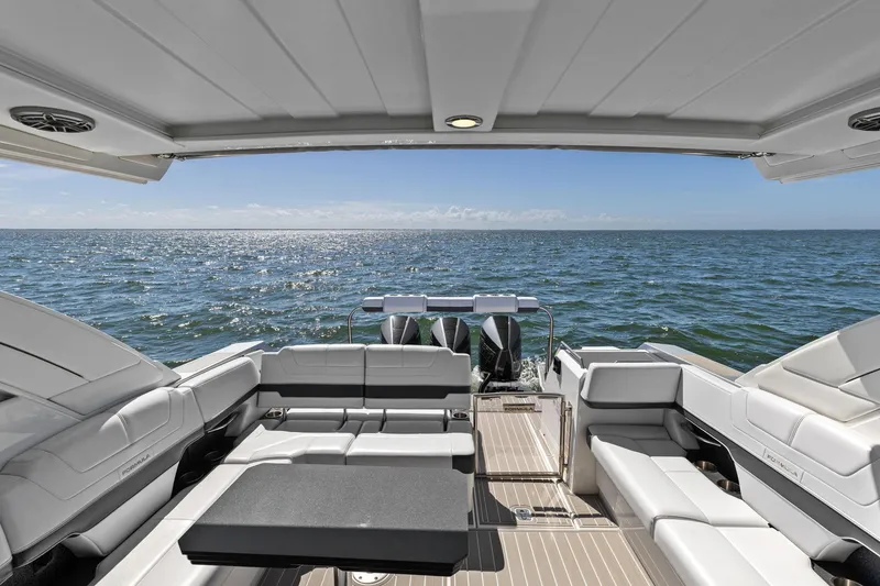 Slide: The Image of 2023 Formula 380 Super Sport Crossover OB, luxurious boat interior with ocean view. - 13