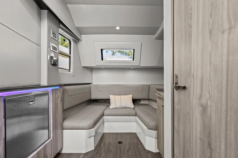 Slide: The Image of 2023 Formula 380 Super Sport Crossover OB interior with modern seating and sleek design. - 22