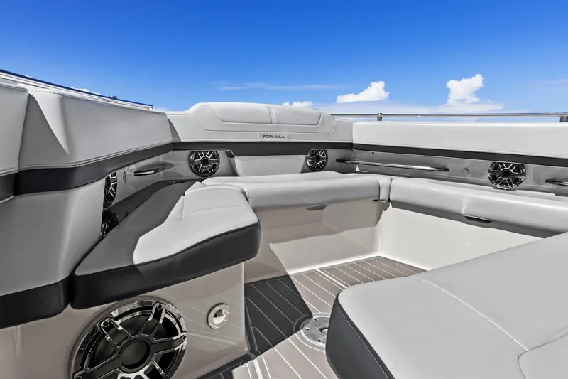 Slide: The Image of 2023 Formula 380 Super Sport Crossover OB interior with luxurious seating and sleek design. - 7