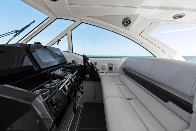 Slide: The Image of 2023 Formula 380 Super Sport Crossover OB interior with sleek design and modern controls. - 9