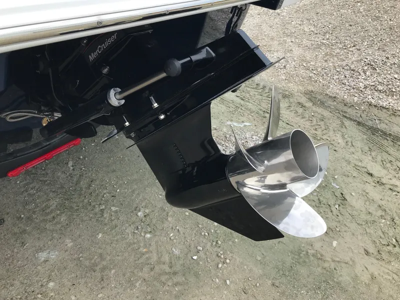 Slide: The Image of 2026 Four Winns H-1 FREEDOM boat with MerCruiser propeller detail. - 12