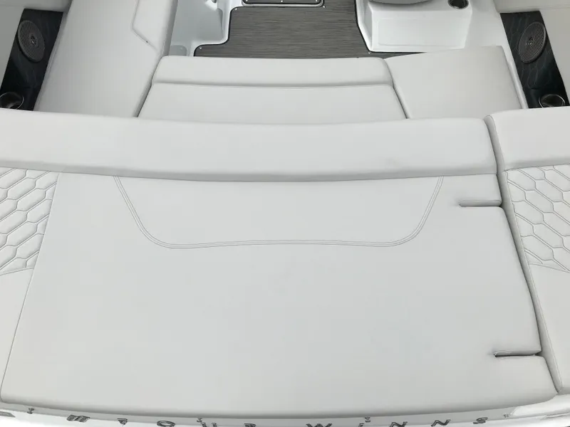 Slide: The Image of 2026 Four Winns H-1 FREEDOM boat interior with sleek white seating and modern design. - 16