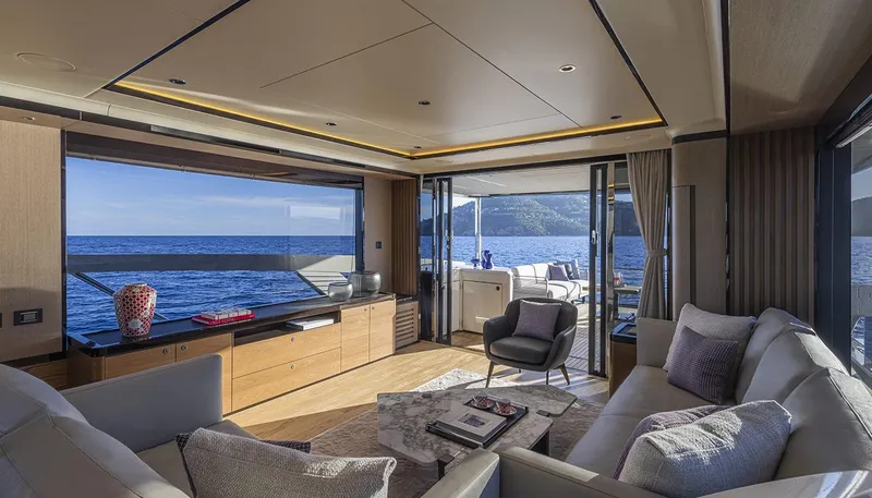 Slide: The Image of Luxurious interior of 2026 Absolute NAVETTA 75 yacht with ocean view and modern furnishings. - 25