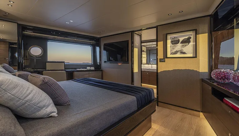 Slide: The Image of Luxurious bedroom interior of 2026 Absolute NAVETTA 75 yacht with modern decor and ocean view. - 30