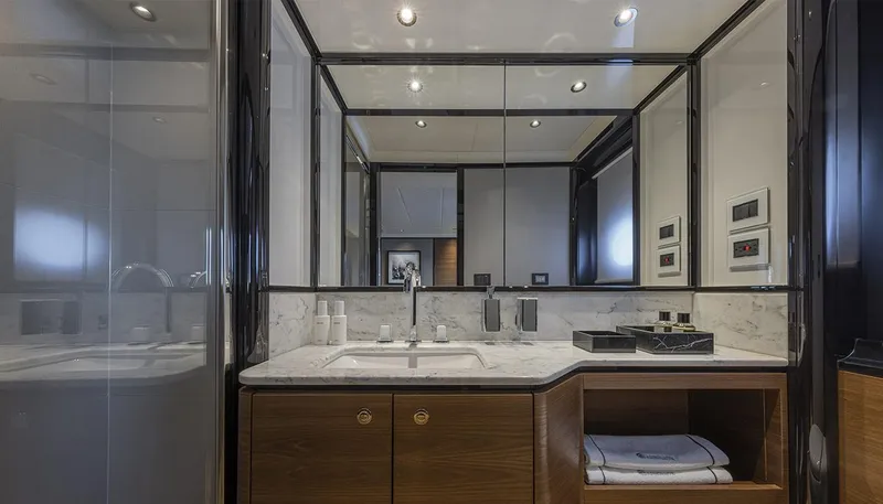 Slide: The Image of Luxurious bathroom interior of Absolute NAVETTA 75 yacht, featuring modern design and elegant fixtures. - 37