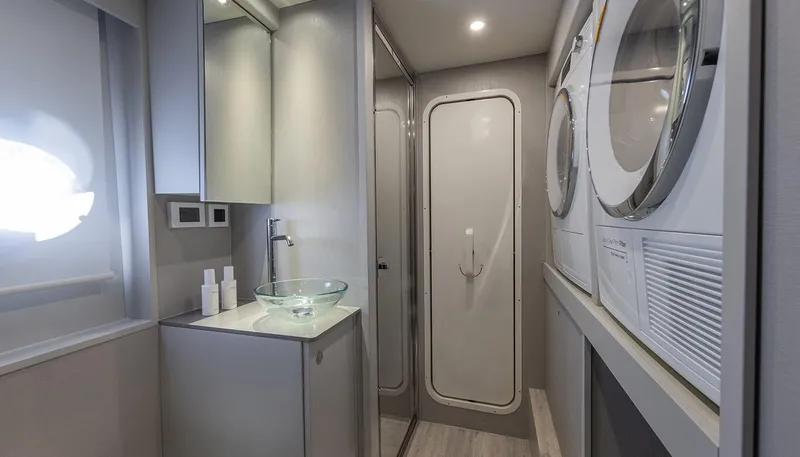 Slide: The Image of Laundry area with modern appliances in Absolute NAVETTA 75 yacht, 2026 model. - 40