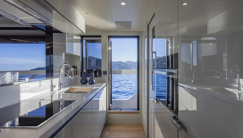 Slide: The Image of Luxurious kitchen interior of 2026 Absolute NAVETTA 75 yacht with ocean view. - 39