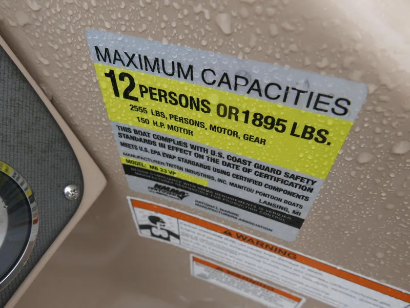 Slide: The Image of 2017 Manitou Aurora VP capacity label, maximum 12 persons or 1895 lbs, 150 HP motor. - 18