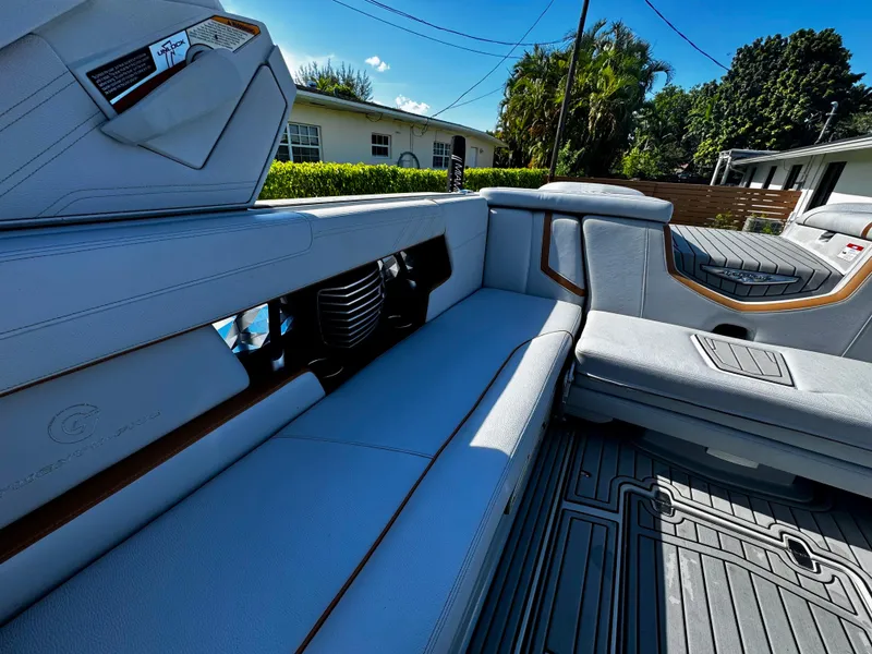 Slide: The Image of 2020 Nautique Super Air Nautique G25 Coastal Edition interior with luxurious seating and modern design. - 13