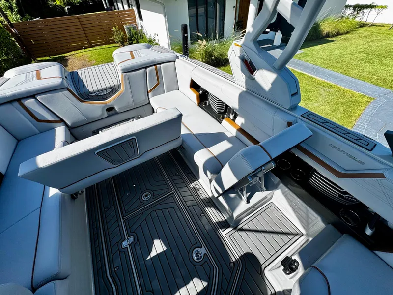 Slide: The Image of 2020 Nautique Super Air Nautique G25 Coastal Edition interior with luxurious seating and modern design. - 17
