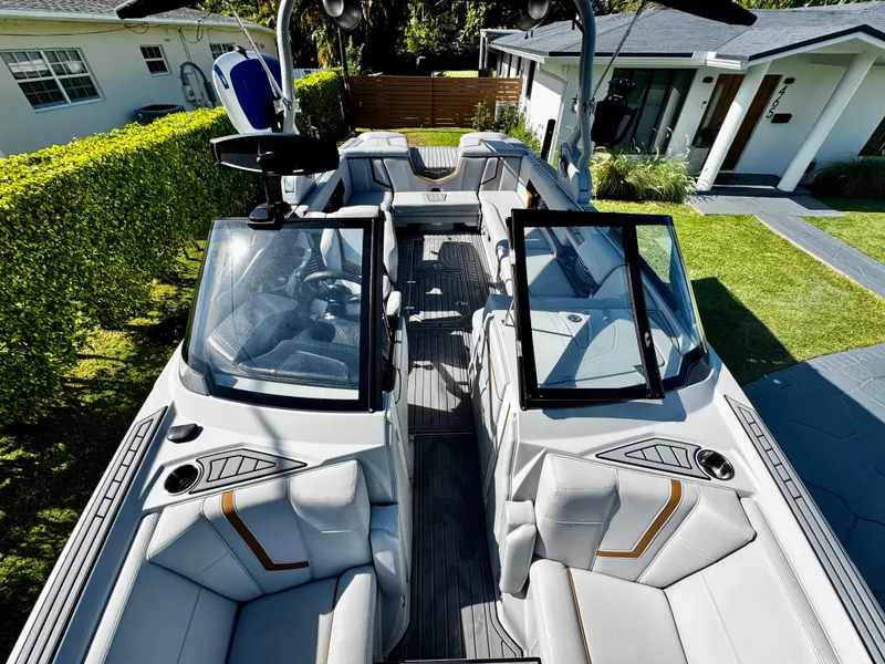 Slide: The Image of 2020 Nautique Super Air Nautique G25 Coastal Edition boat with sleek interior design. - 21