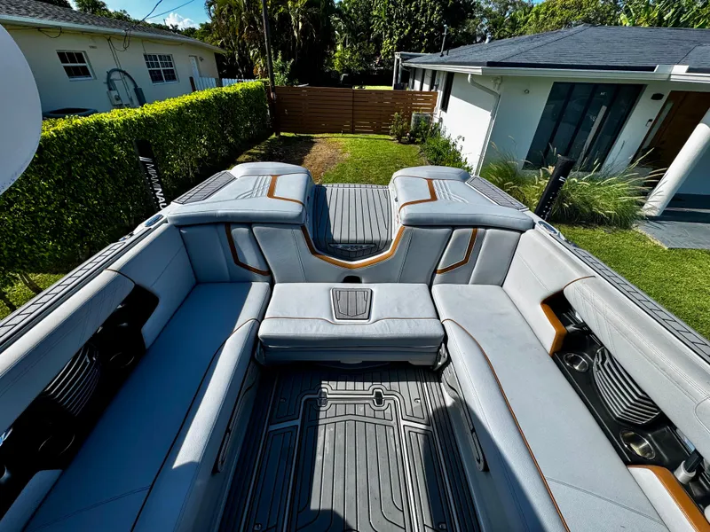Slide: The Image of 2020 Nautique Super Air Nautique G25 Coastal Edition interior with luxurious seating and modern design. - 9