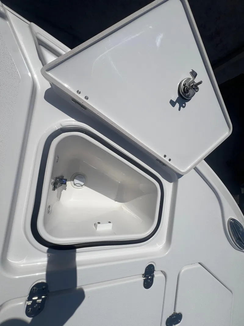 Slide: The Image of Open storage compartment on 2026 Blackfin 262 HB boat deck. - 20