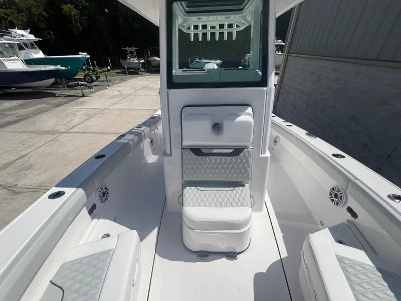 Slide: The Image of 2026 Blackfin 262 HB boat interior with cushioned seating and modern design. - 25