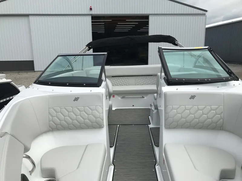 Slide: The Image of 2026 Four Winns H-2 FREEDOM boat interior with white seating and modern design. - 12