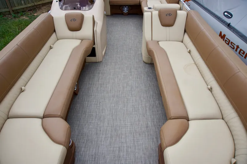 Slide: The Image of 2020 Avalon Catalina Platinum Rear Lounger interior with beige and brown seating. - 11