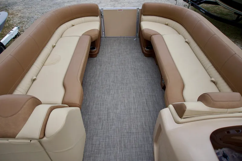 Slide: The Image of 2020 Avalon Catalina Platinum Rear Lounger interior with beige and brown seating. - 12