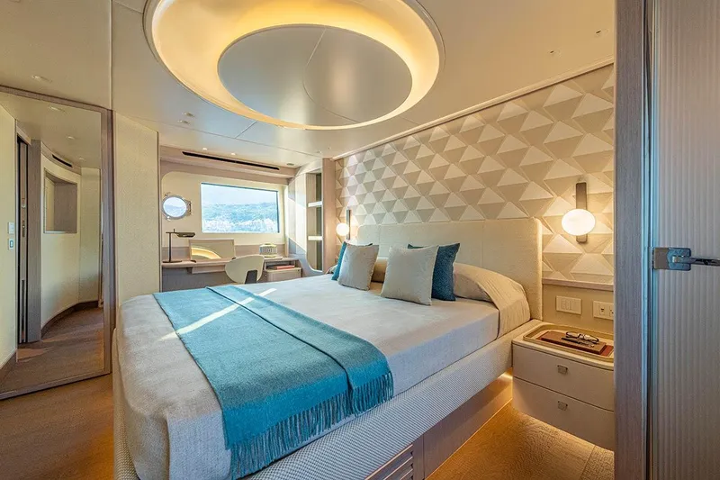Slide: The Image of Luxurious bedroom interior of 2026 Absolute NAVETTA 70 yacht with modern design elements. - 18