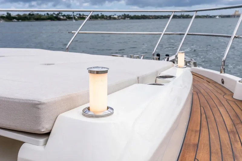 Slide: The Image of Luxurious deck of 2026 Absolute NAVETTA 70 yacht with elegant lighting and seating. - 26