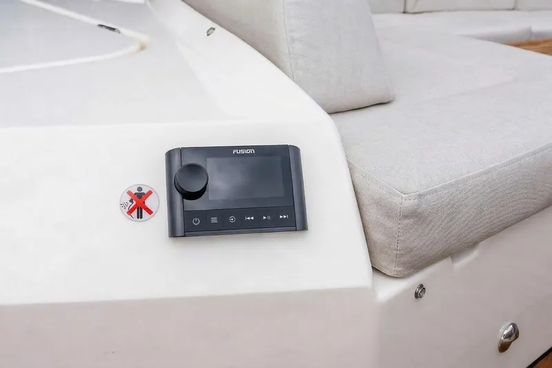 Slide: The Image of Control panel on Absolute NAVETTA 70 yacht, 2026 model, with cushioned seating. - 27