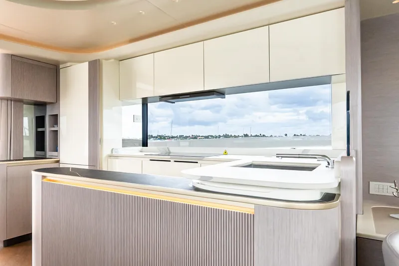 Slide: The Image of Luxurious kitchen interior of 2026 Absolute NAVETTA 70 yacht with modern design and panoramic window. - 33