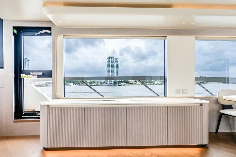 Slide: The Image of Luxurious interior of 2026 Absolute NAVETTA 70 yacht with panoramic windows and modern design. - 40