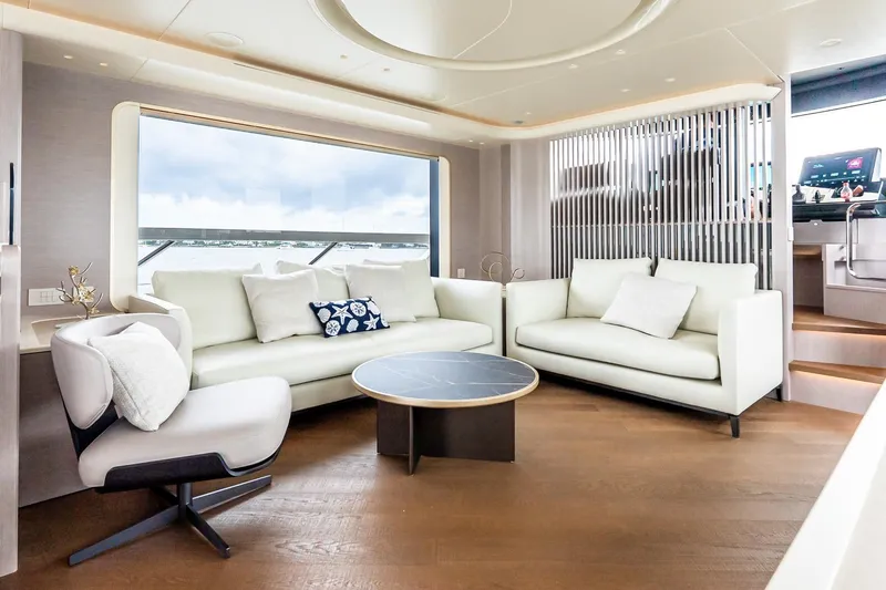 Slide: The Image of Luxurious interior of 2026 Absolute NAVETTA 70 yacht with modern white sofas and elegant decor. - 41