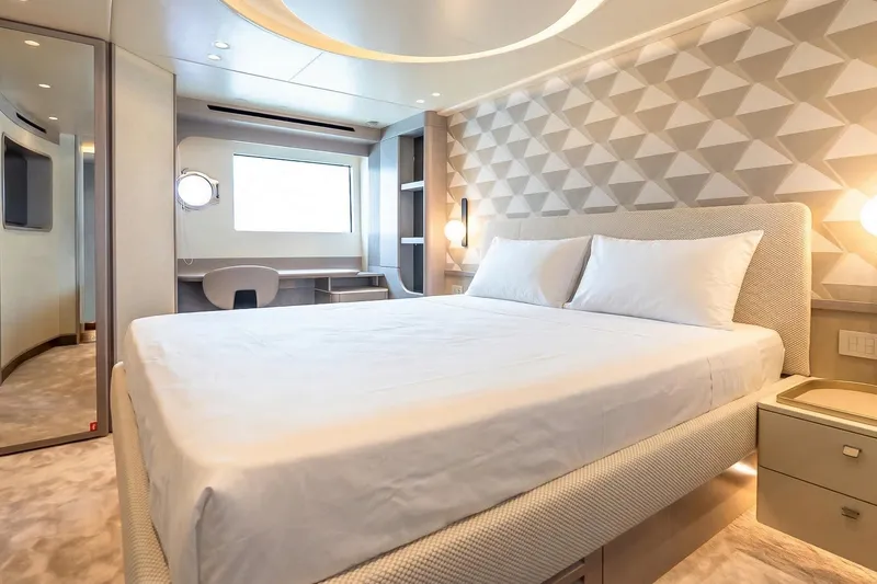Slide: The Image of Luxurious bedroom interior on Absolute NAVETTA 70 yacht, 2026 model, featuring modern design and elegant decor. - 63