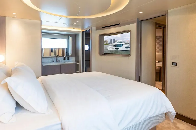 Slide: The Image of Luxurious bedroom interior of 2026 Absolute NAVETTA 70 yacht with modern design elements. - 64
