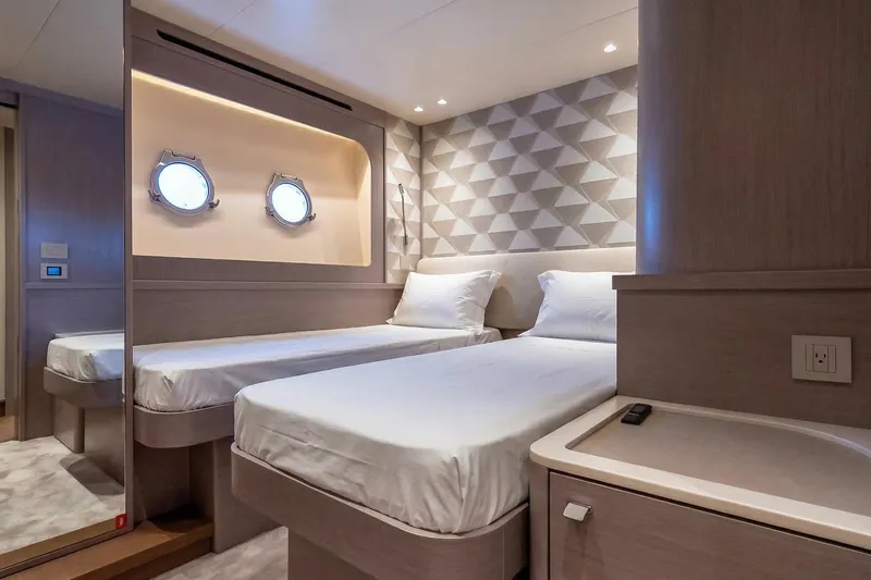 Slide: The Image of Luxurious twin cabin interior of 2026 Absolute NAVETTA 70 yacht with modern design. - 69