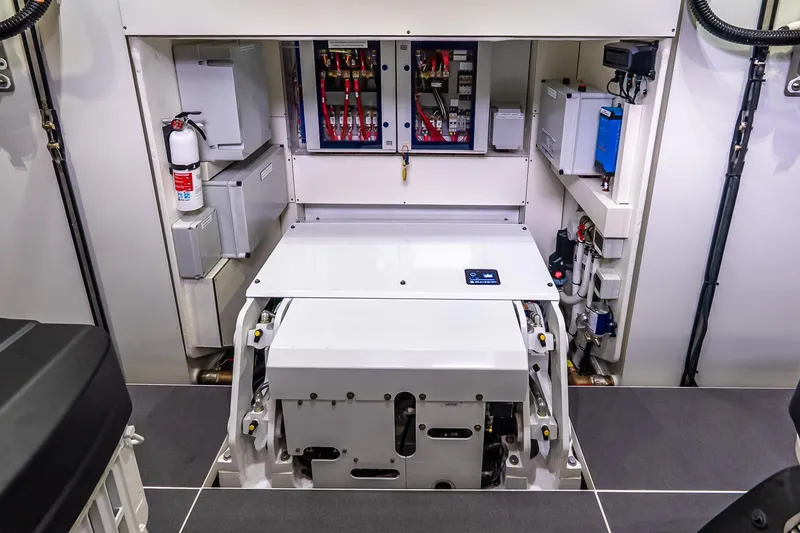 Slide: The Image of Engine room of 2026 Absolute NAVETTA 70 yacht, showcasing electrical systems and equipment. - 80