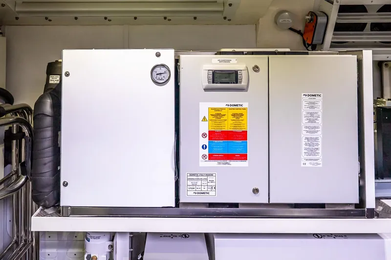 Slide: The Image of Air conditioning unit in Absolute NAVETTA 70 yacht, 2026 model, featuring Dometic technology. - 84