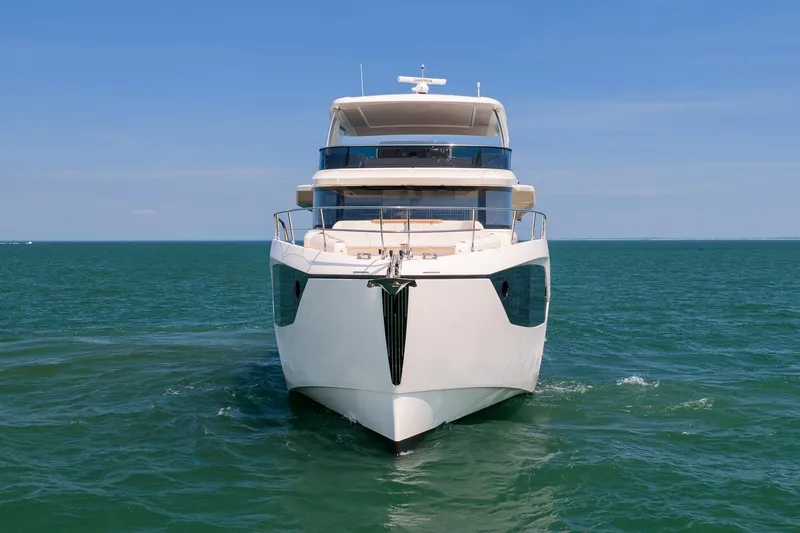 Slide: The Image of Luxury Absolute Navetta 70 yacht cruising on open sea, 2027 model. - 1