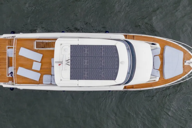 Slide: The Image of Luxurious deck of 2026 Absolute NAVETTA 70 yacht with elegant seating and ocean view. - 17