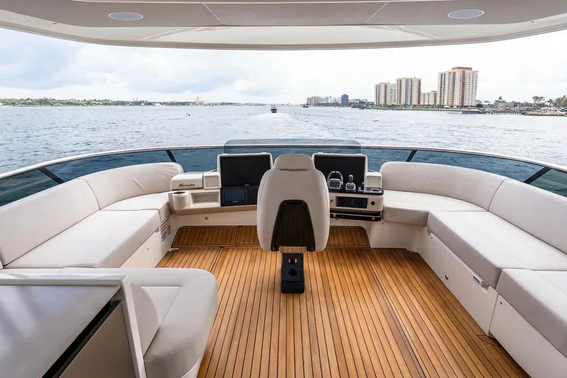 Slide: The Image of Cockpit of 2026 Absolute NAVETTA 70 yacht with advanced navigation systems and controls. - 24