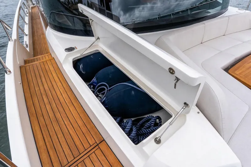Slide: The Image of Control panel on Absolute NAVETTA 70 yacht, 2026 model, with cushioned seating. - 29