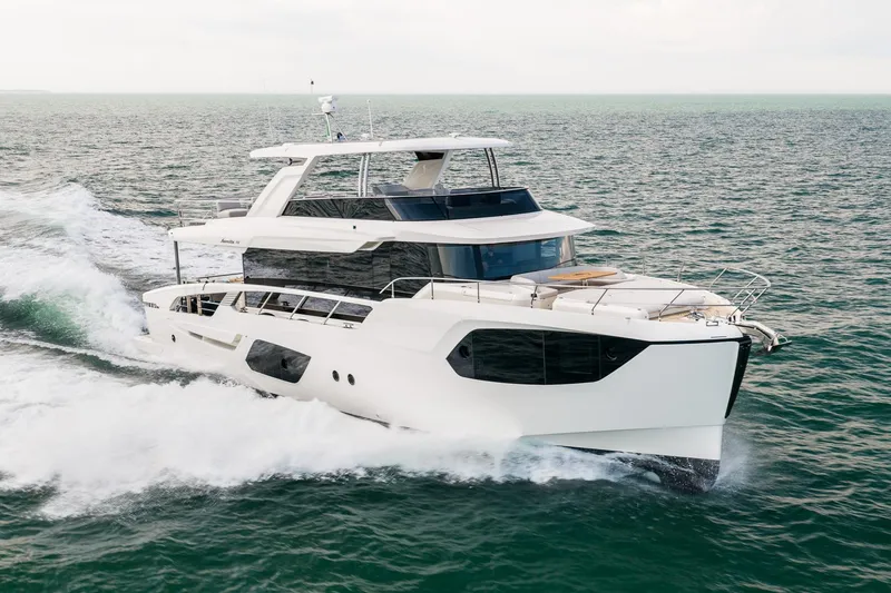 Slide: The Image of Luxurious 2027 Absolute Navetta 70 yacht cruising on open sea. - 5