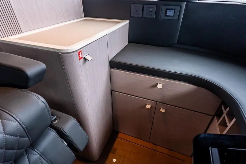 Slide: The Image of Luxurious bedroom interior on Absolute NAVETTA 70 yacht, 2026 model, featuring modern design and ambient lighting. - 50