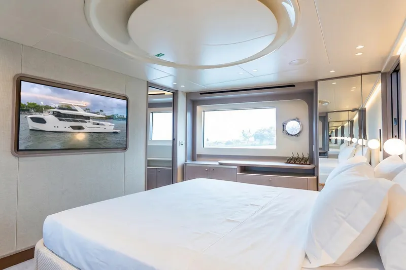 Slide: The Image of Luxurious interior of 2026 Absolute NAVETTA 70 yacht with ocean view and elegant staircase. - 55