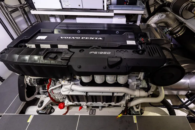 Slide: The Image of Engine room of 2026 Absolute NAVETTA 70 yacht with modern equipment and ladder access. - 85