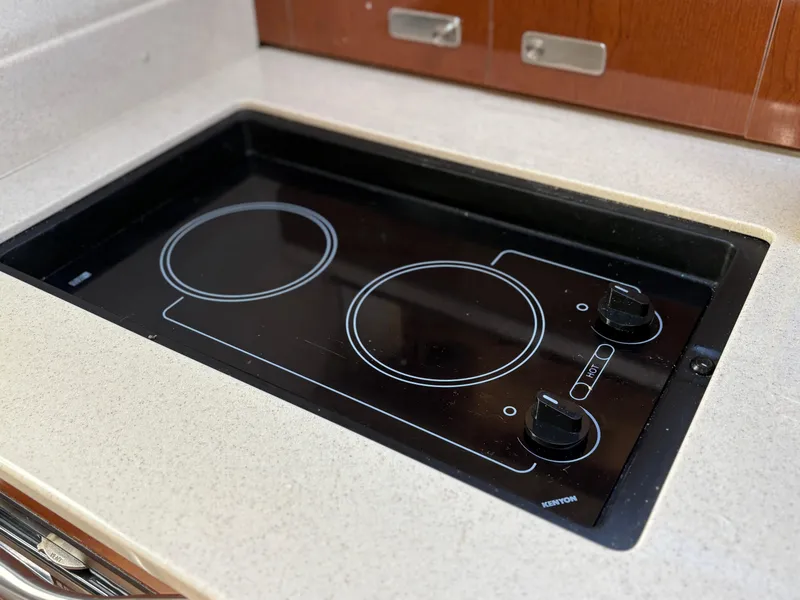 Slide: The Image of Stovetop in 2012 Sea Ray 350 Sundancer yacht kitchen. - 22