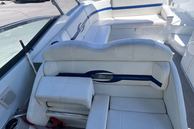 Slide: The Image of 2008 Formula 310 Bowrider interior with white and blue seating. - 12