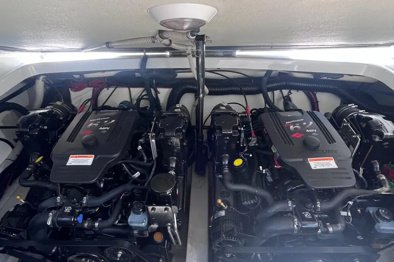 Slide: The Image of Twin MerCruiser engines in a 2008 Formula 310 Bowrider boat. - 15