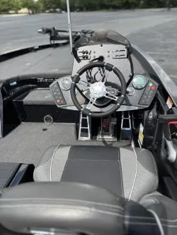 Slide: The Image of 2021 Ranger Z520C Ranger Cup boat cockpit with steering wheel and controls. - 5