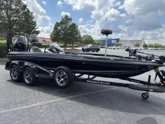 Slide: The Image of 2021 Ranger Z520C Ranger Cup Equipped boat on trailer in parking lot. - 6